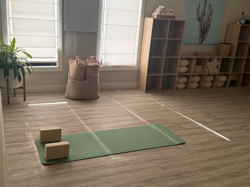The Movement Studio at Stillpoint Wellness with a yoga mat and blocks